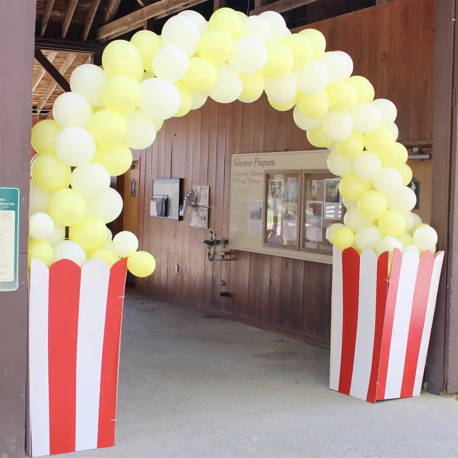 Carnival Party Ideas - Popcorn Balloon Arch by Lola Tangled