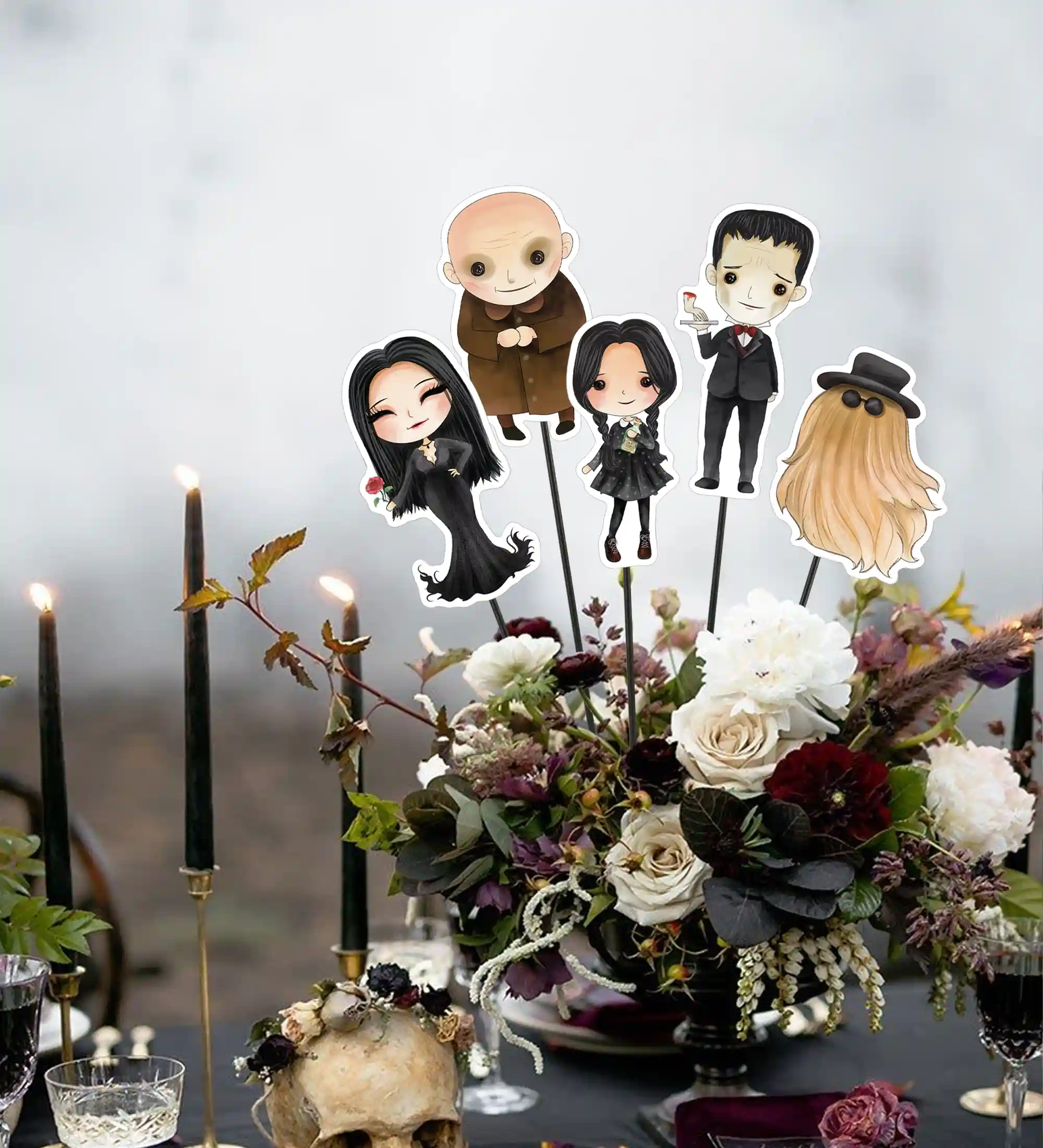 Addams family centerpiece ideas for you next celebrations. Download the printables for a Wednesday birthday party, Addams Family themed baby shower, or a Wednesday viewing party. Includes all the favorite characters Cousin Itt, Wednesday, Morticia, Gomez, Lurch, Uncle Fester, Pugsley, Thing, and more.