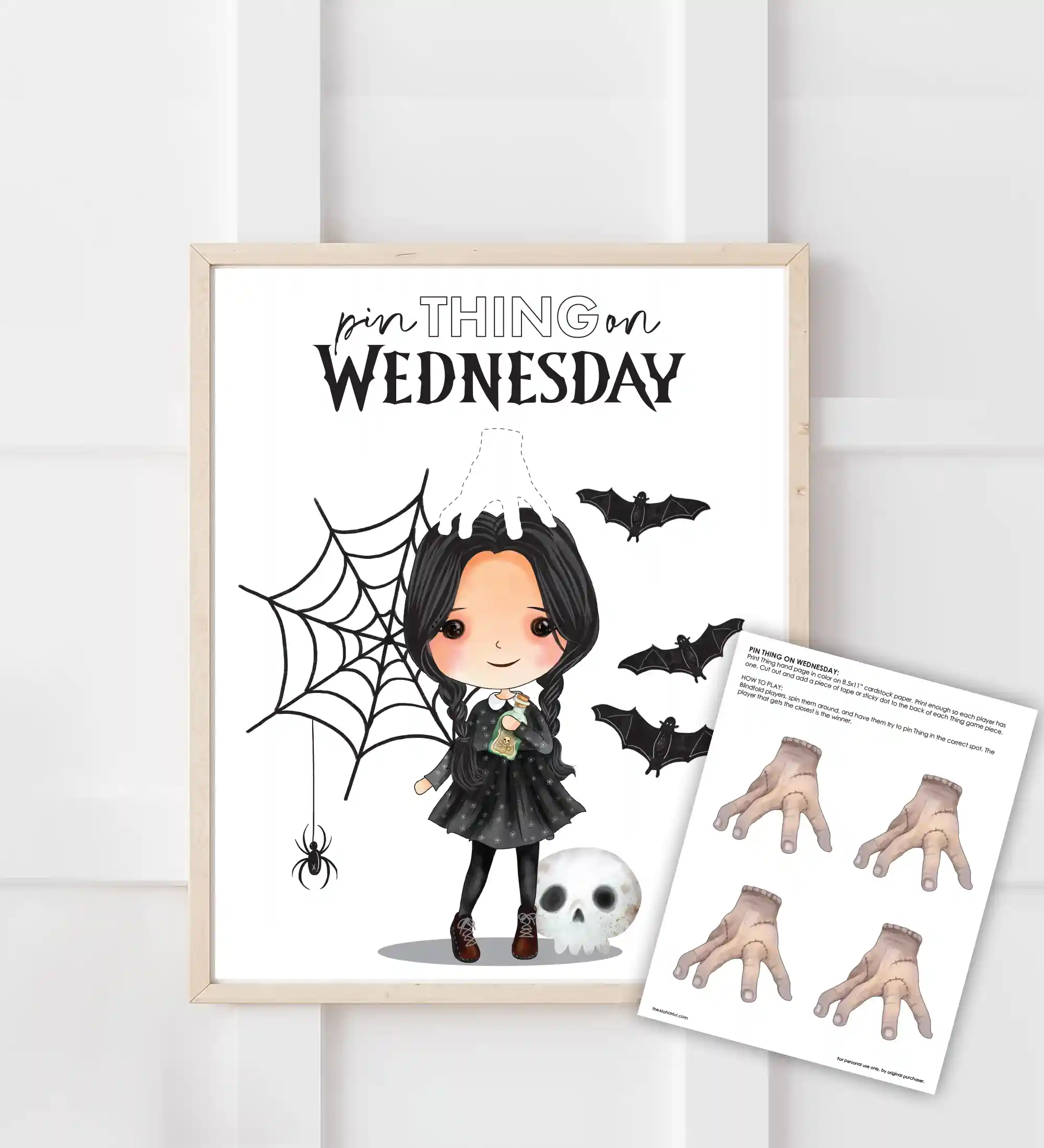 Addams family party game called Pin Thing on Wednesday. Pin Thing on Wednesday is similar to pin the tail games and is super fun and easy for kids of all ages to play. Download the printables for a Wednesday birthday party, Addams Family themed baby shower, or a Wednesday viewing party.