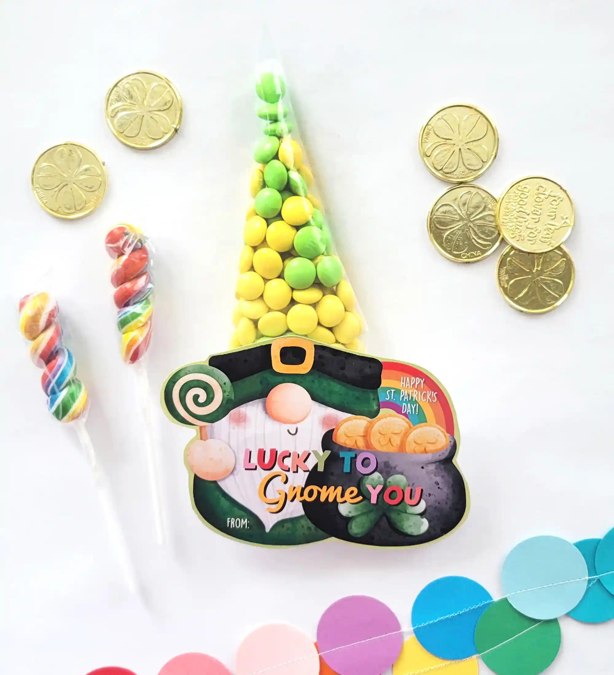 Printable St. Patrick's Day gift tag for a fun and easy gift for St. Patrick's Day. Gfit tag says: "Lucky to Gnome You. Happy St. Patrick's Day!!" Attach gift tag to a small bag of St. Patrick's Day treats like M&Ms, skittles, etc. to make the gnome's hat or a bag of chocolate coins.